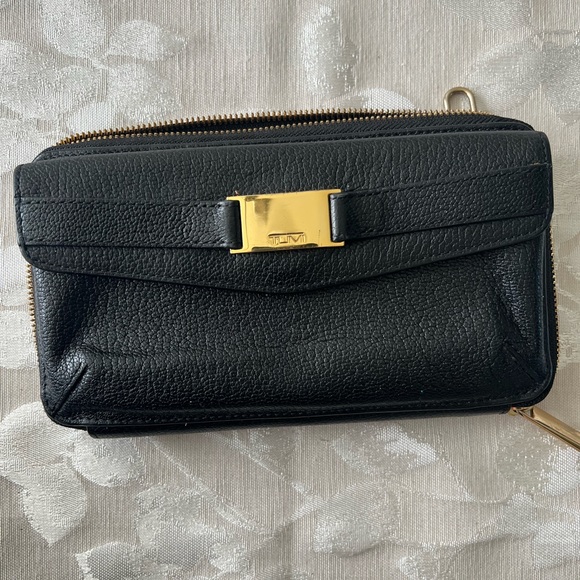 Tumi Handbags - New Tumi wallet with zipper
